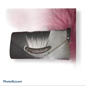 Charming charlie RSVP silver clutch